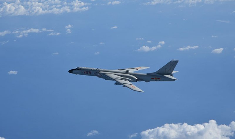 Beijing's South China Sea bombers fly in face of protests