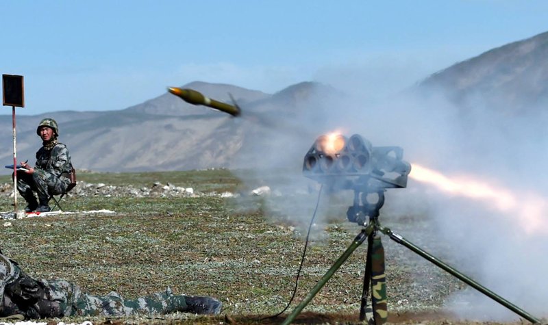 PLA fields and develops rocket artillery, large and small