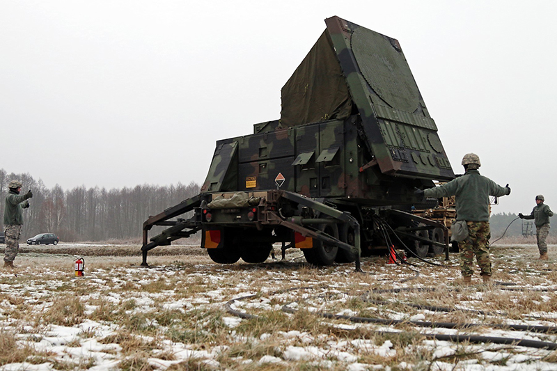 Soldiers signal the area is clear while emplacing the Patriot radar set during Panther Assurance, an interoperability deployment readiness exercise in 2016 at Skwierzyna, Poland. (US Army photo)