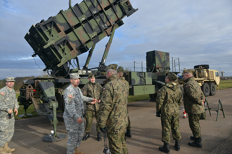 In a 2015 visit to 5th Battalion, 7th Air Defense Artillery Regiment at Smith Barracks, Baumholder, Germany, Polish soldiers were briefed about individual pieces of equipment. (US Army photo)